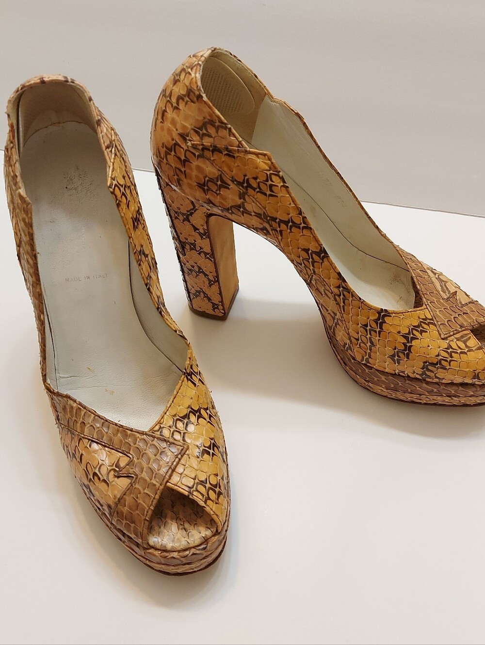 Vintage Miu Miu snakeskin peep-toe platform heels with a chunky block heel.